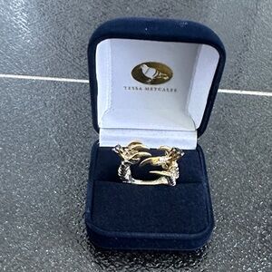 Topaz and Tanzanite - Pigeon Grasp with Mini Rings by Tessa Metcalfe